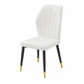Chaise en similicuir blanc avec pieds en métal noir et doré
